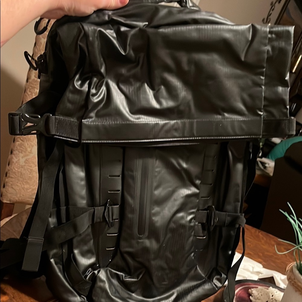 Oakley Waterproof Black Roll-Top Backpack with Tactical Design